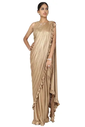 Metallic beige drape saree.