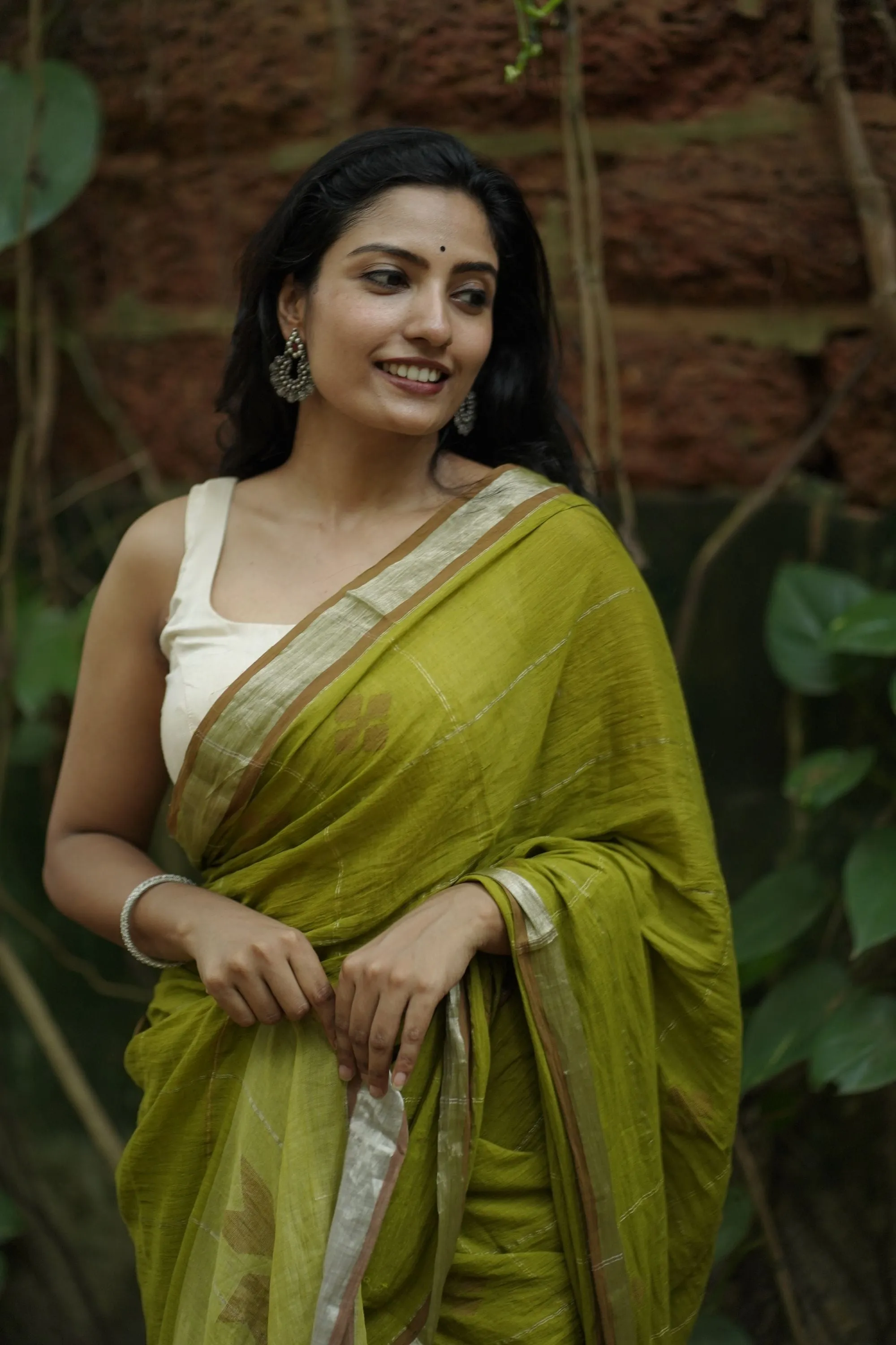 Sitara -light green zari by cotton saree